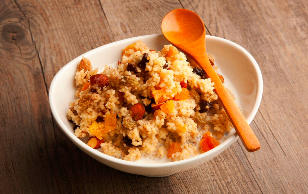 Couscous is not just a tasty side, it makes for a hearty delicious breakfast! Whatever dried fruit or nuts you have around the house can act as toppings.